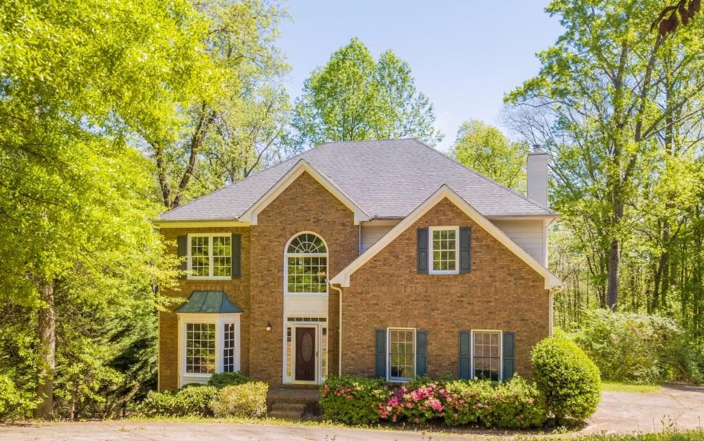 4 bedroom, 3 bathroom, 2,610 sq ft single family residence sold at 6450 Ivey Hill Drive, Cumming, GA 30040