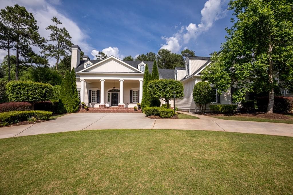 4 bedroom, 6 bathroom, 5,675 sq ft single family residence sold at 310 Highgrove Drive, Fayetteville, GA 30215