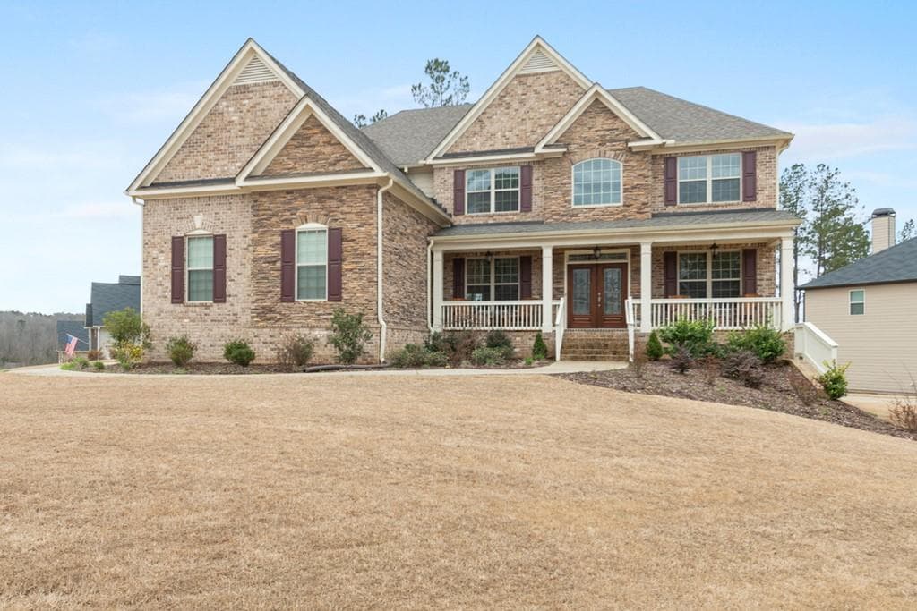 5 bedroom, 4 bathroom, 3,778 sq ft single family residence sold at 6585 Canyon Cove, Cumming, GA 30028