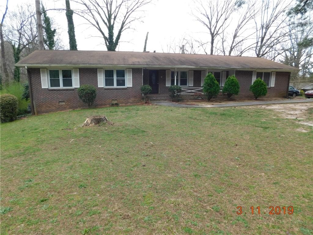 5 bedroom, 3 bathroom, 2,476 sq ft single family residence sold at 524 Rowland Road, Stone Mountain, GA 30083