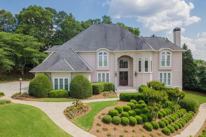 6 bedroom, 6 bathroom, 6,459 sq ft single family residence sold at 8365 Sentinae Chase Drive, Roswell, GA 30076