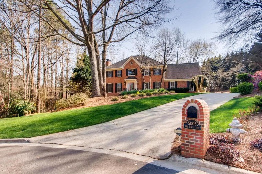 4 bedroom, 5 bathroom, 3,880 sq ft single family residence sold at 5005 Oak Bluff Court, Atlanta, GA 30350