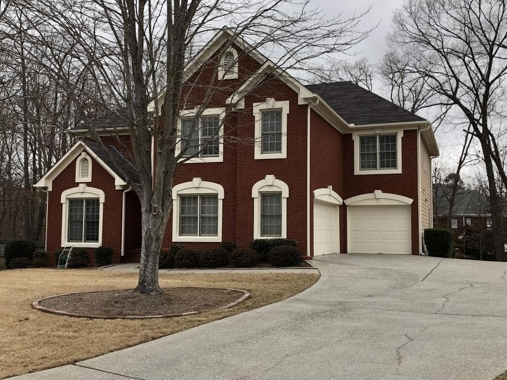 6 bedroom, 6 bathroom, 5,135 sq ft single family residence sold at 2109 Sugar Springs Drive, Lawrenceville, GA 30043