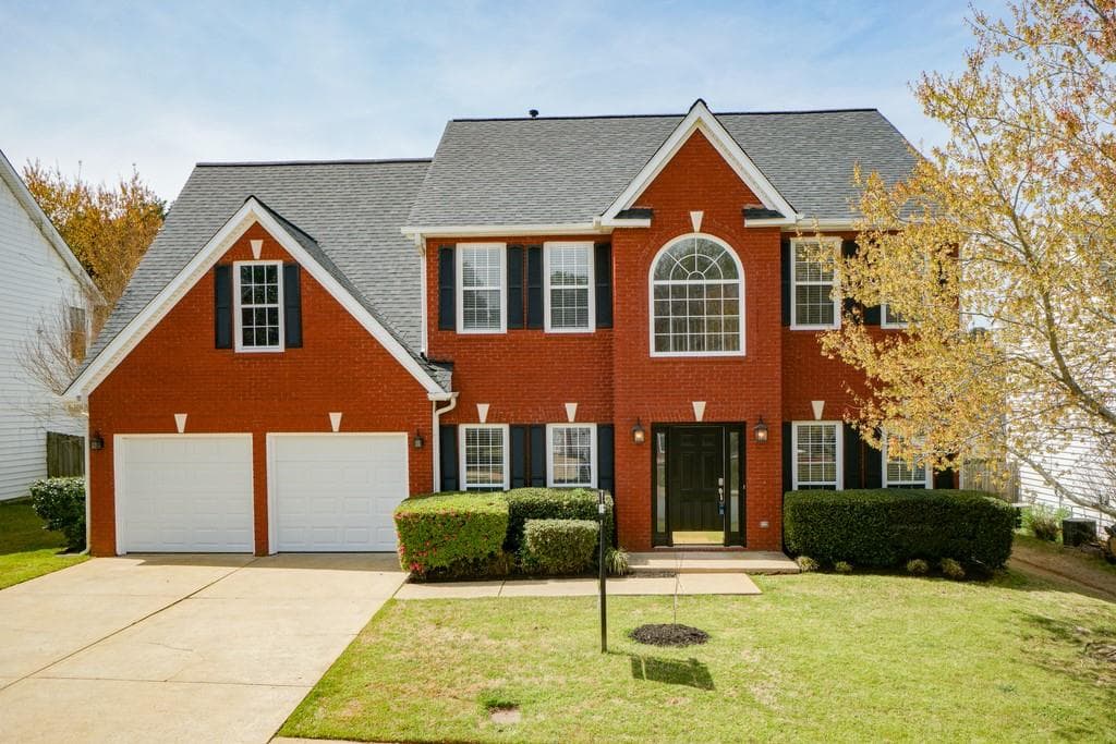 4 bedroom, 3 bathroom, 2,675 sq ft single family residence sold at 1312 Woodland View Road, Lawrenceville, GA 30043