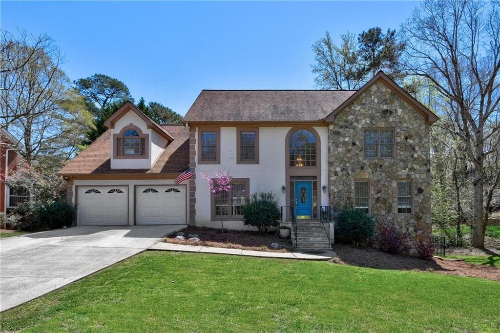 4 bedroom, 4 bathroom, 5,755 sq ft single family residence sold at 102 N Lakeside Drive, Kennesaw, GA 30144