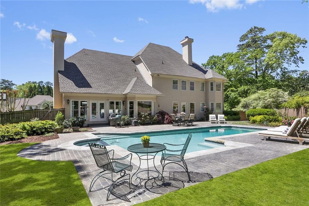 5 bedroom, 4 bathroom, 7,768 sq ft single family residence sold at 5405 Vernon Walk, Atlanta, GA 30327