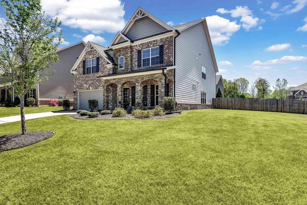 5 bedroom, 4 bathroom, 3,395 sq ft single family residence sold at 5210 Rustic Court, Cumming, GA 30040
