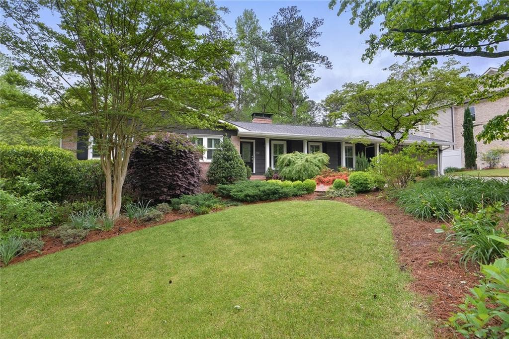 4 bedroom, 3 bathroom, 3,100 sq ft single family residence sold at 6619 Cherry Tree Lane, Atlanta, GA 30328