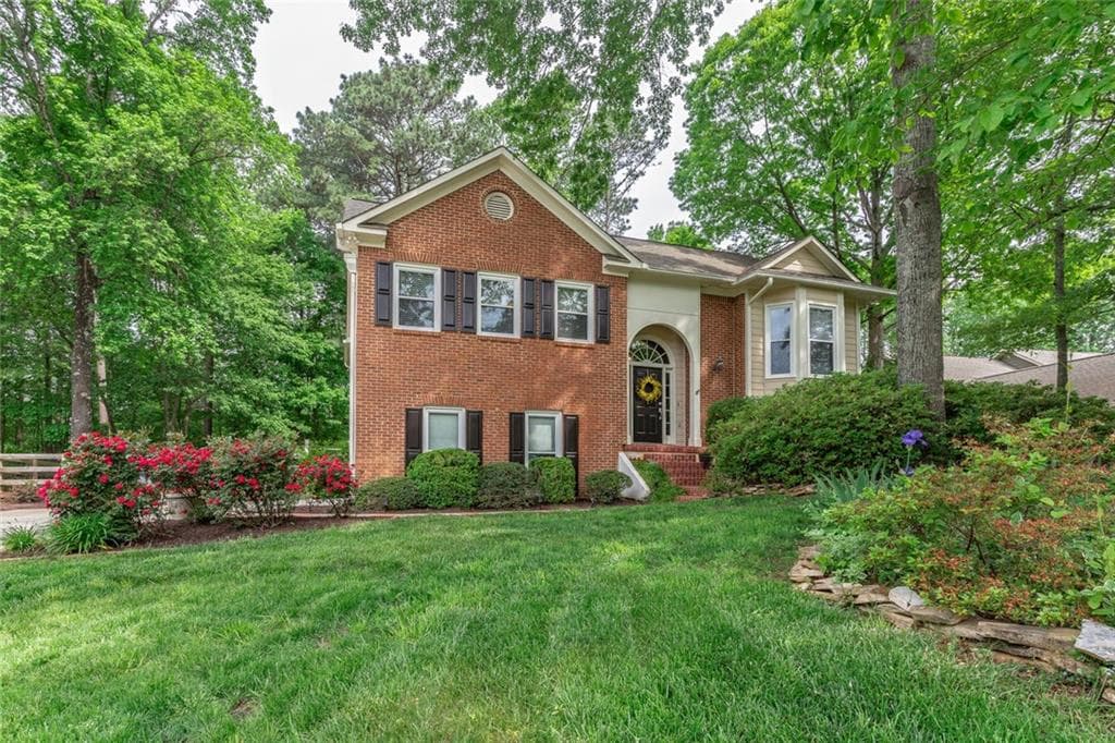 4 bedroom, 3 bathroom, 2,261 sq ft single family residence sold at 1330 Gran Forest Drive, Cumming, GA 30041