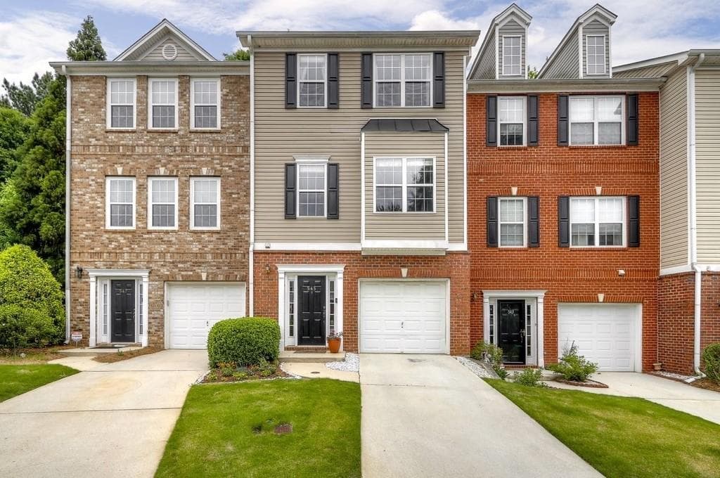 4 bedroom, 4 bathroom, 1,447 sq ft townhouse sold at 545 Lantern Wood Drive, Scottdale, GA 30079