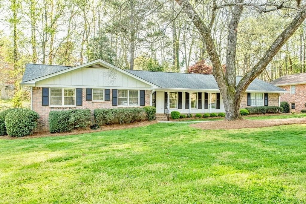 4 bedroom, 3 bathroom single family residence sold at 4882 Cambridge Drive, Dunwoody, GA 30338