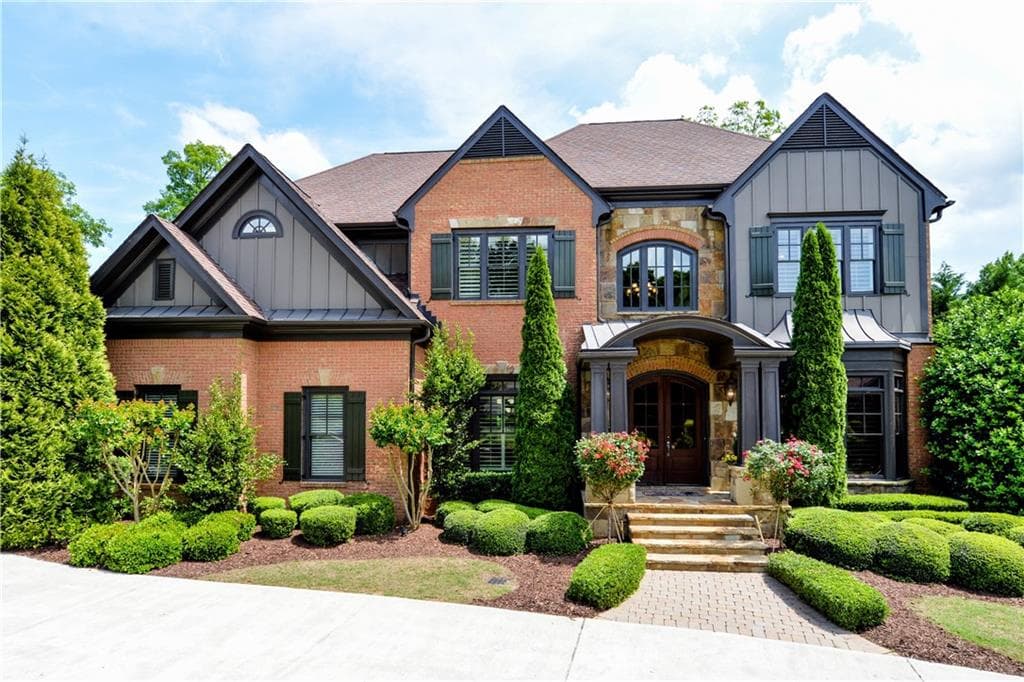 7 bedroom, 8 bathroom, 7,615 sq ft single family residence sold at 2415 Bute Cliff Trace, Cumming, GA 30041