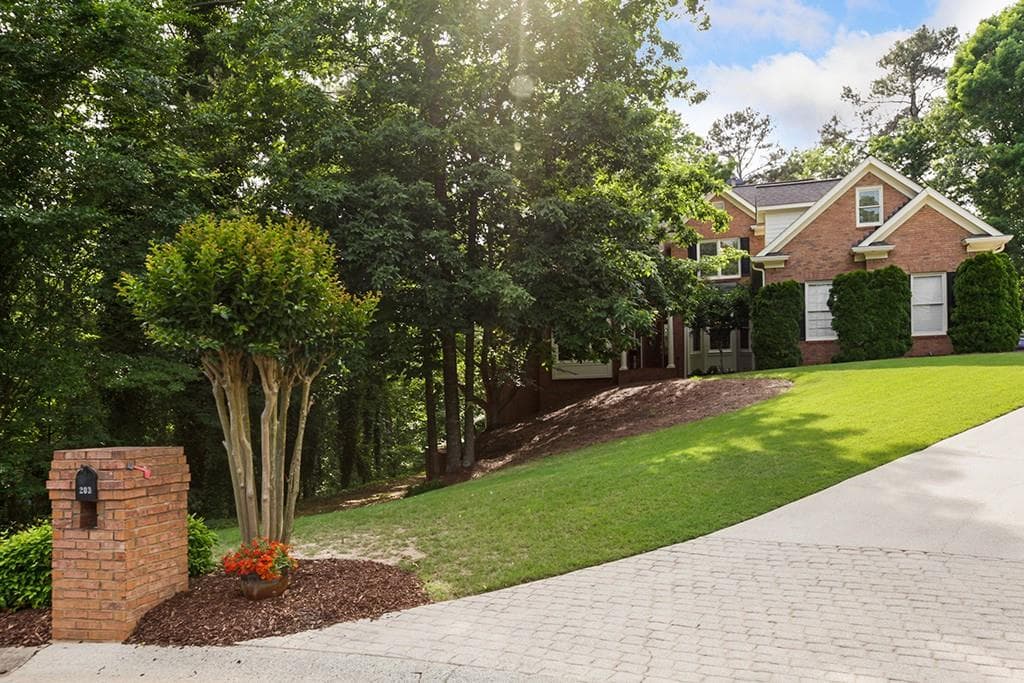 6 bedroom, 5 bathroom, 5,300 sq ft single family residence sold at 203 Madison Falls Court, Canton, GA 30114