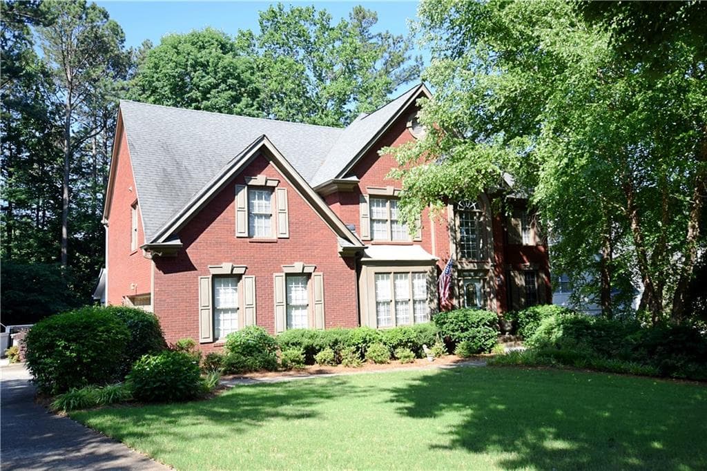 5 bedroom, 4 bathroom, 4,698 sq ft single family residence sold at 1465 Lockridge Drive, Cumming, GA 30041