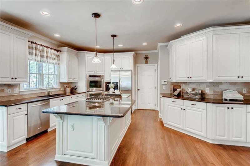 5 bedroom, 5 bathroom, 6,344 sq ft single family residence sold at 105 Oakhurst Leaf Drive, Milton, GA 30004
