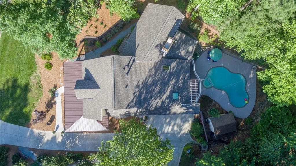 6 bedroom, 6 bathroom, 5,456 sq ft single family residence sold at 990 Riverside Trace, Atlanta, GA 30328
