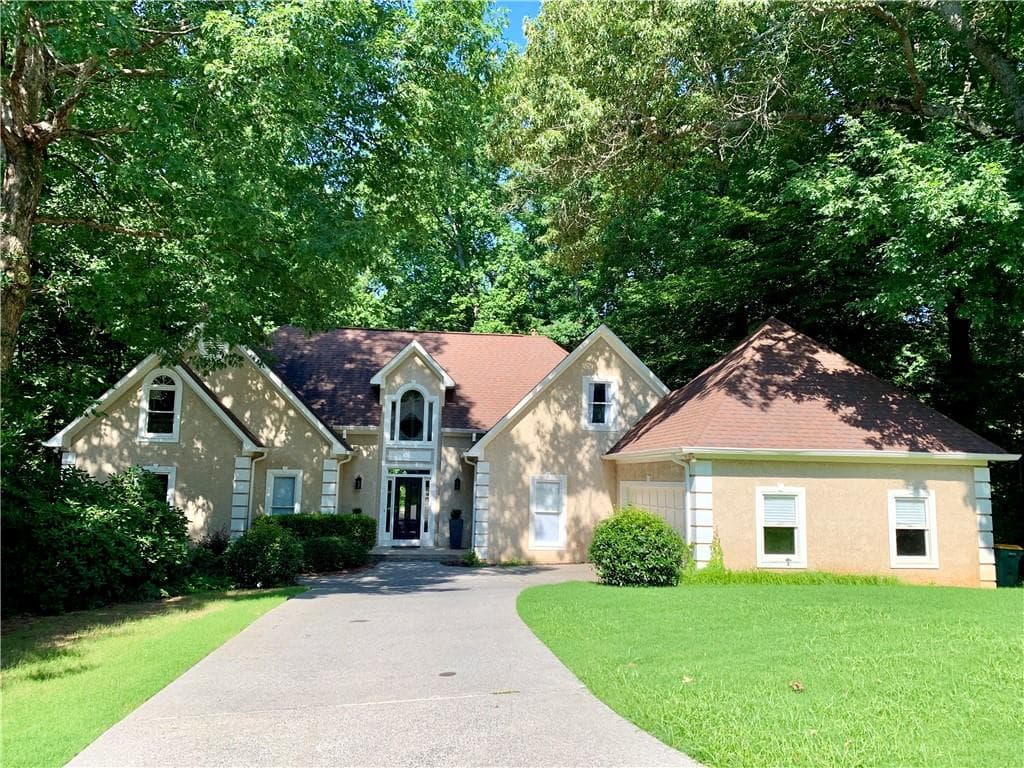6 bedroom, 4 bathroom, 4,949 sq ft single family residence sold at 2853 Clary Hill Drive, Roswell, GA 30075