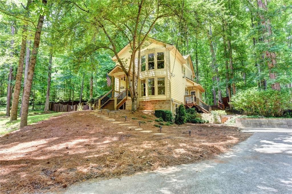 4 bedroom, 4 bathroom, 3,215 sq ft single family residence sold at 5050 Buice Road, Alpharetta, GA 30022
