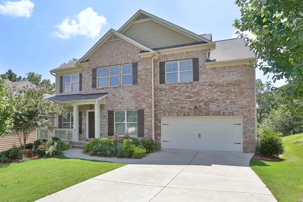 5 bedroom, 4 bathroom, 3,430 sq ft single family residence sold at 1610 Sugar Ridge Drive, Suwanee, GA 30024
