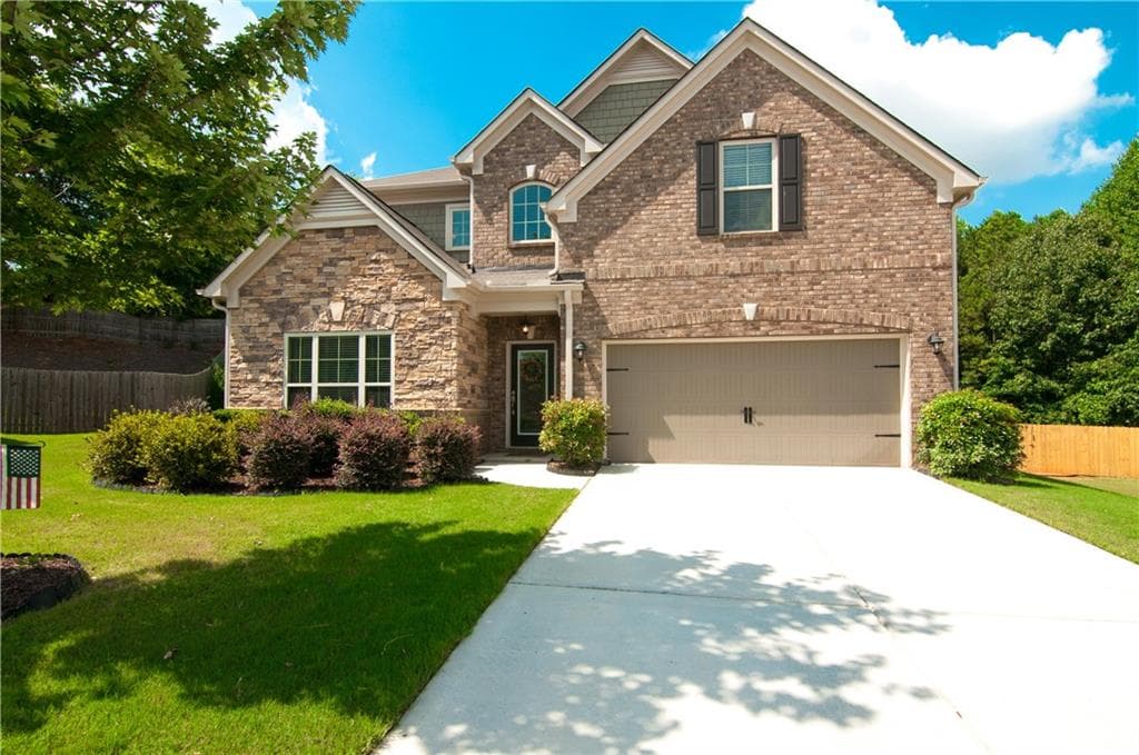 4 bedroom, 3 bathroom, 3,364 sq ft single family residence sold at 280 Woods Creek Drive, Suwanee, GA 30024