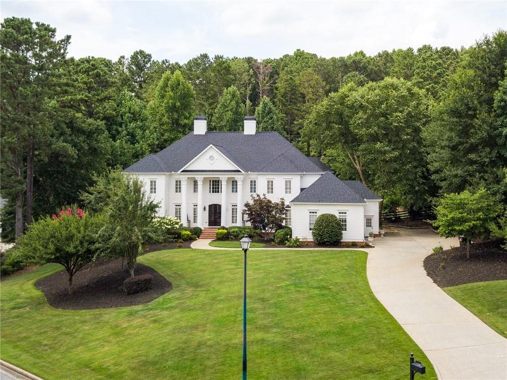 6 bedroom, 5 bathroom, 7,640 sq ft single family residence sold at 340 Lake Bend Court, Milton, GA 30004