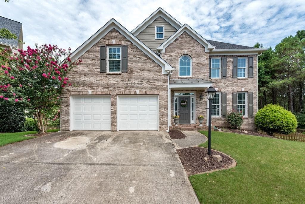 6 bedroom, 4 bathroom, 4,074 sq ft single family residence sold at 128 Bear Cave Trail, Woodstock, GA 30189