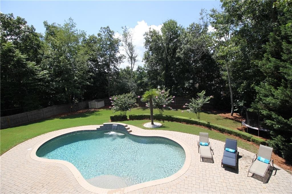 4 bedroom, 3 bathroom, 3,037 sq ft single family residence sold at 825 Cedar Creek Drive, Suwanee, GA 30024