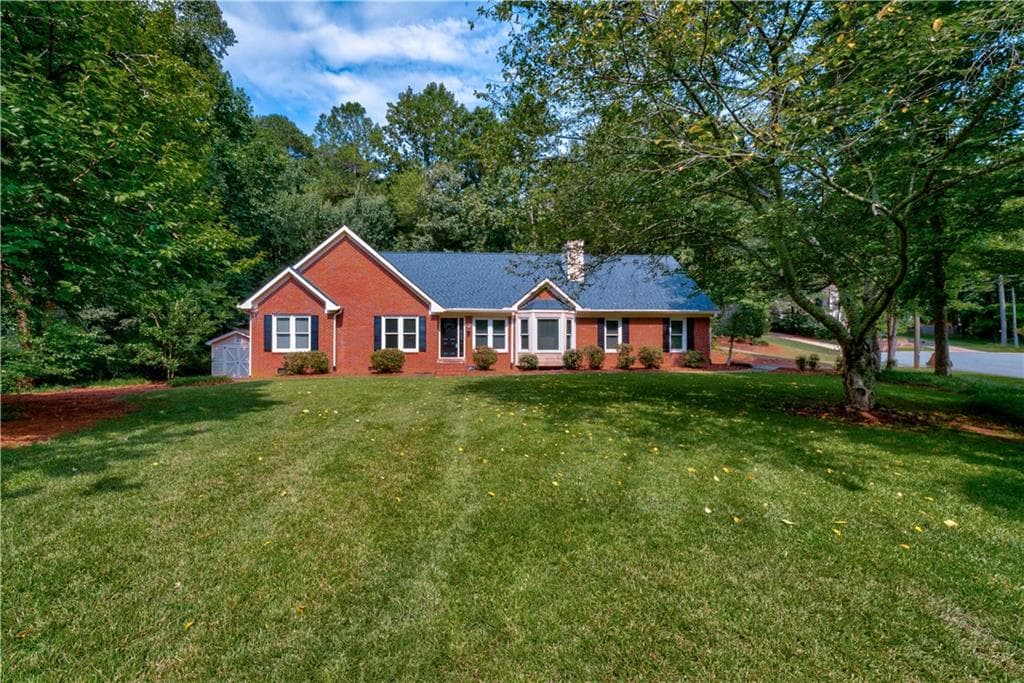 4 bedroom, 3 bathroom, 2,404 sq ft single family residence sold at 2705 Cambridge Court, Cumming, GA 30041