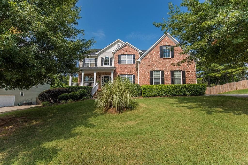 6 bedroom, 5 bathroom, 4,445 sq ft single family residence sold at 1000 Forest Creek Drive, Canton, GA 30115