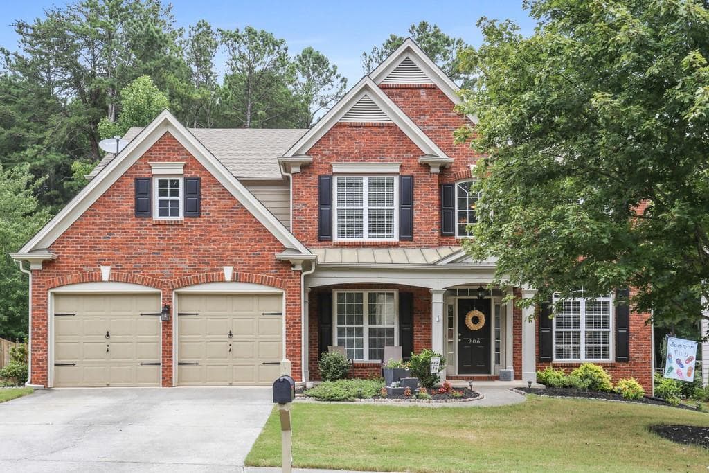 5 bedroom, 3 bathroom, 2,940 sq ft single family residence sold at 206 Tyler Drive, Woodstock, GA 30188