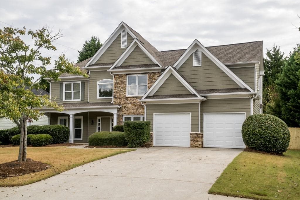 4 bedroom, 3 bathroom, 2,615 sq ft single family residence sold at 11085 Regal Forest Drive, Suwanee, GA 30024