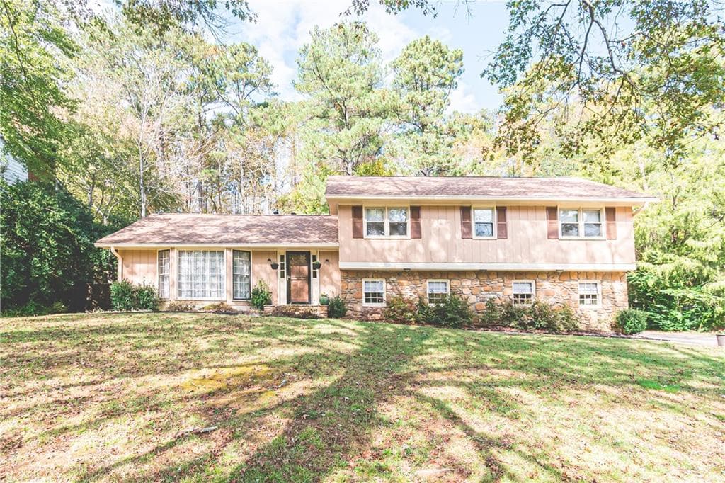 4 bedroom, 3 bathroom, 2,161 sq ft single family residence sold at 380 Wickerberry Lane, Roswell, GA 30075