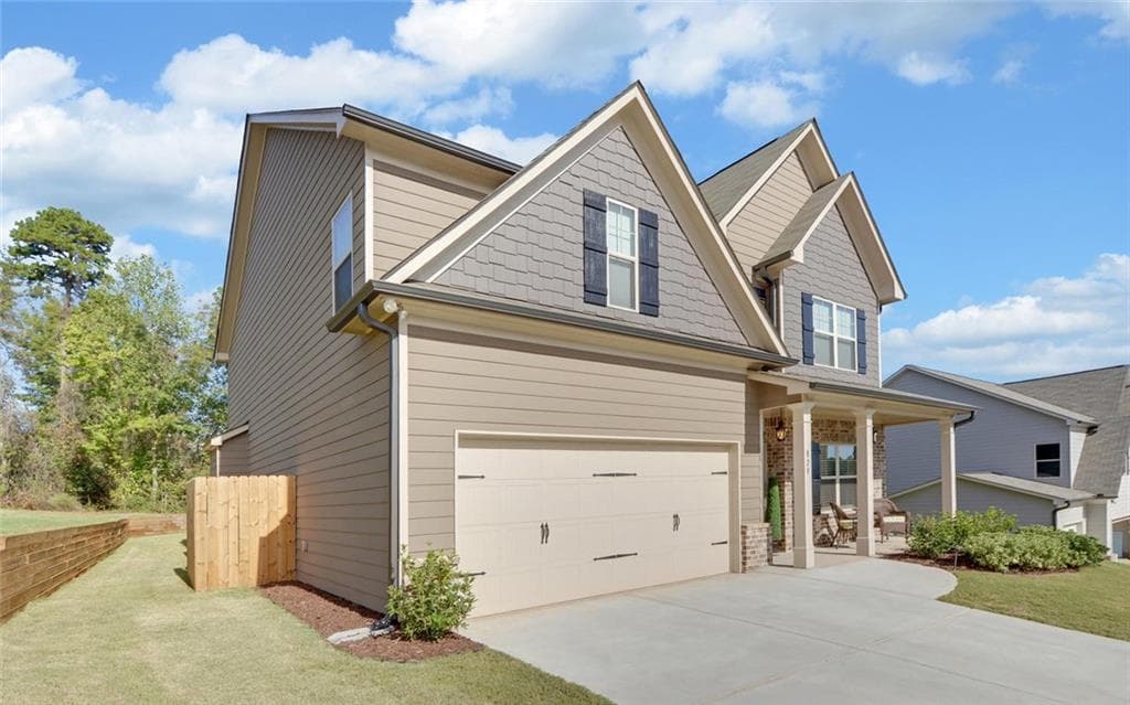 5 bedroom, 4 bathroom, 2,650 sq ft single family residence sold at 829 Joy Drive, Hoschton, GA 30548
