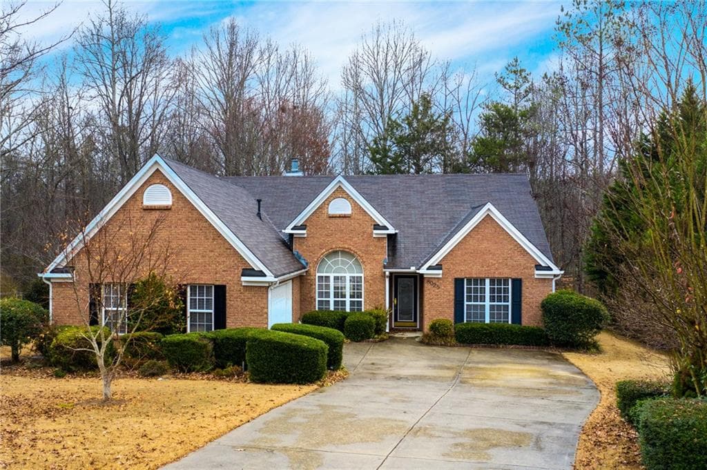 3 bedroom, 2 bathroom, 2,010 sq ft single family residence sold at 8025 Paddocks Mill Drive, Cumming, GA 30041