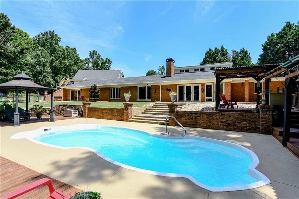 4 bedroom, 4 bathroom, 3,140 sq ft single family residence sold at 2429 Rock Springs Road, Buford, GA 30519