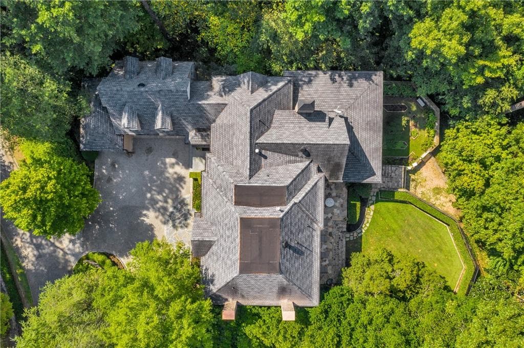 5 bedroom, 7 bathroom, 6,008 sq ft single family residence sold at 12 Interlochen Drive, Atlanta, GA 30342