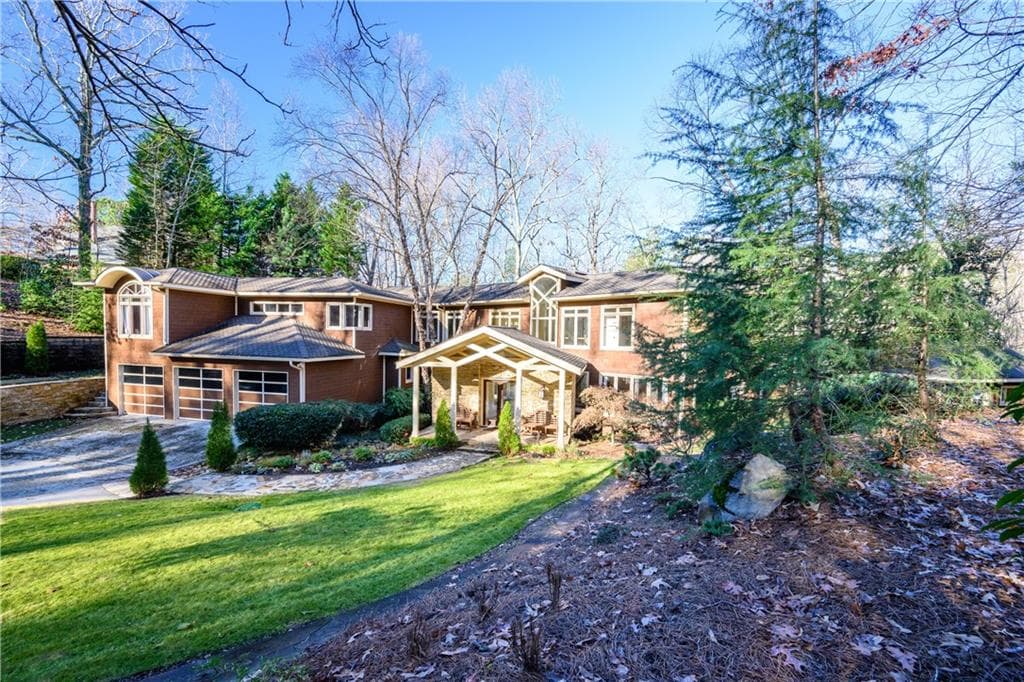 4 bedroom, 7 bathroom, 7,126 sq ft single family residence sold at 4767 Riverview Road, Atlanta, GA 30327