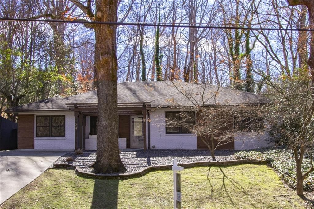 5 bedroom, 3 bathroom, 3,000 sq ft single family residence sold at 1241 Poplar Grove Drive, Atlanta, GA 30306