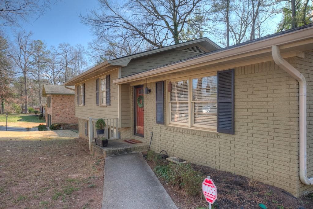 4 bedroom, 2 bathroom, 2,033 sq ft single family residence sold at 2143 Twin Falls Road, Decatur, GA 30032