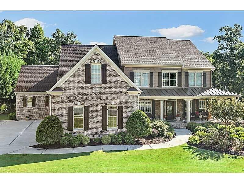 7 bedroom, 6 bathroom, 7,531 sq ft single family residence sold at 5162 Millwood Drive, Canton, GA 30114