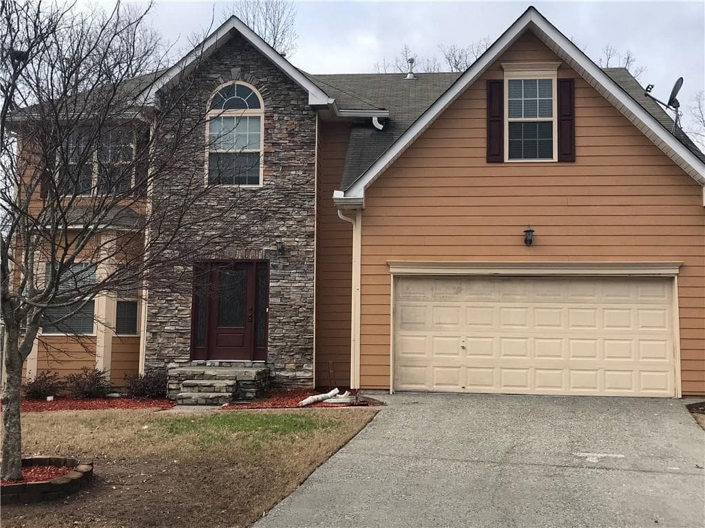 5 bedroom, 4 bathroom, 3,457 sq ft single family residence sold at 955 Tree Top Drive, Suwanee, GA 30024