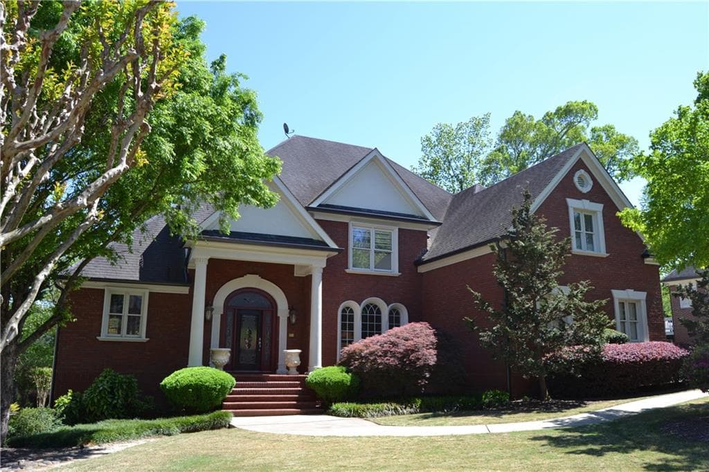 5 bedroom, 7 bathroom, 6,175 sq ft single family residence sold at 2310 WOODLAND LAKE Walk, Snellville, GA 30078