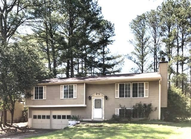 4 bedroom, 3 bathroom, 1,296 sq ft single family residence sold at 1460 Parkmont Drive, Roswell, GA 30076