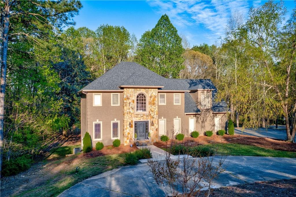 6 bedroom, 5 bathroom, 5,100 sq ft single family residence sold at 12945 Bucksport Court, Roswell, GA 30075
