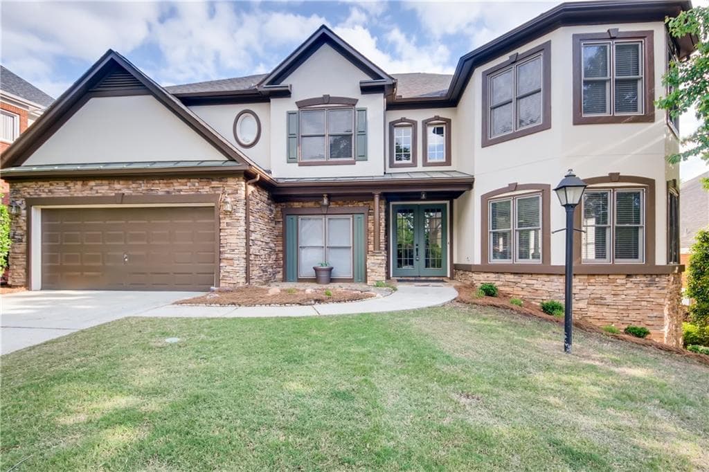 5 bedroom, 4 bathroom, 4,892 sq ft single family residence sold at 1674 Harlington Road, Smyrna, GA 30082