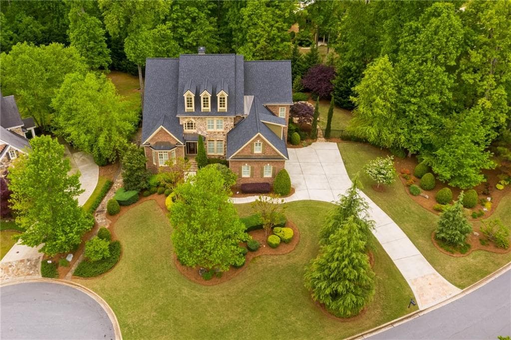 6 bedroom, 6 bathroom, 8,057 sq ft single family residence sold at 2365 Lahinch Court, Kennesaw, GA 30152