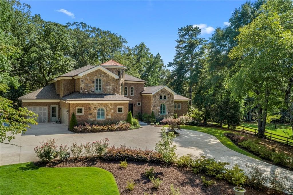 5 bedroom, 7 bathroom, 6,005 sq ft single family residence sold at 1010 JONES Road, Roswell, GA 30075