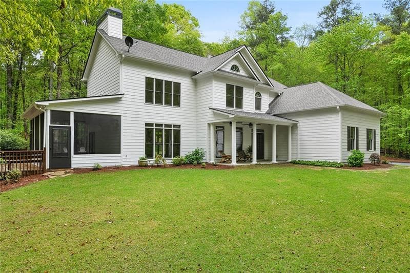 4 bedroom, 3 bathroom, 3,208 sq ft single family residence sold at 14325 Cogburn Road, Milton, GA 30004
