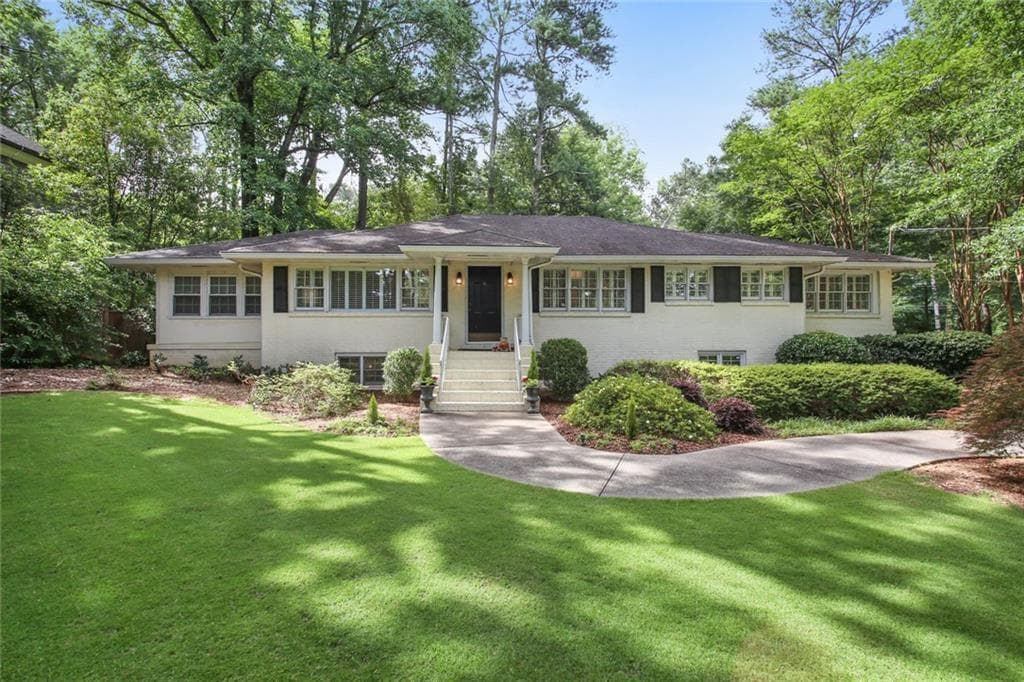 4 bedroom, 3 bathroom, 3,200 sq ft single family residence sold at 850 Moores Mill Road, Atlanta, GA 30327