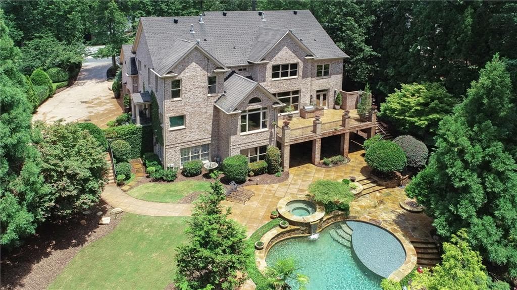 5 bedroom, 5 bathroom, 6,191 sq ft single family residence sold at 1060 River Laurel Drive, Suwanee, GA 30024